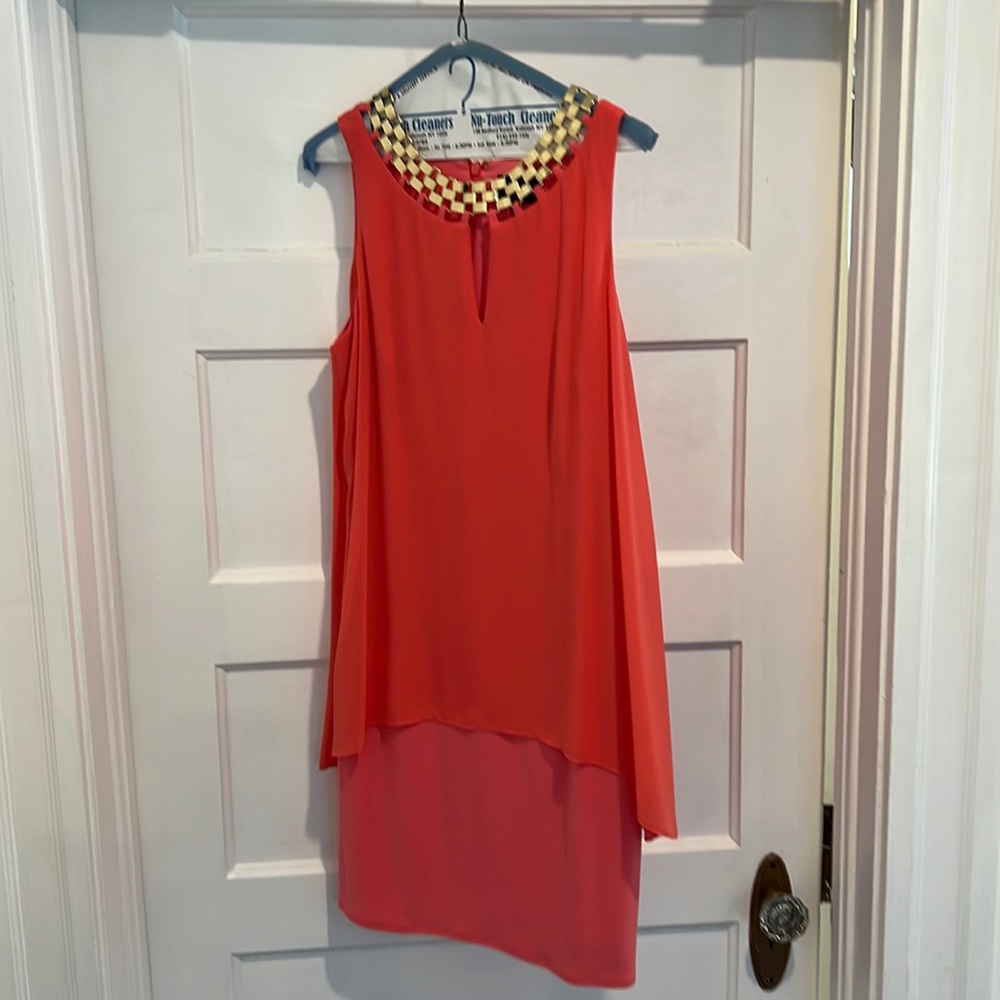 Coral dress with gold collar